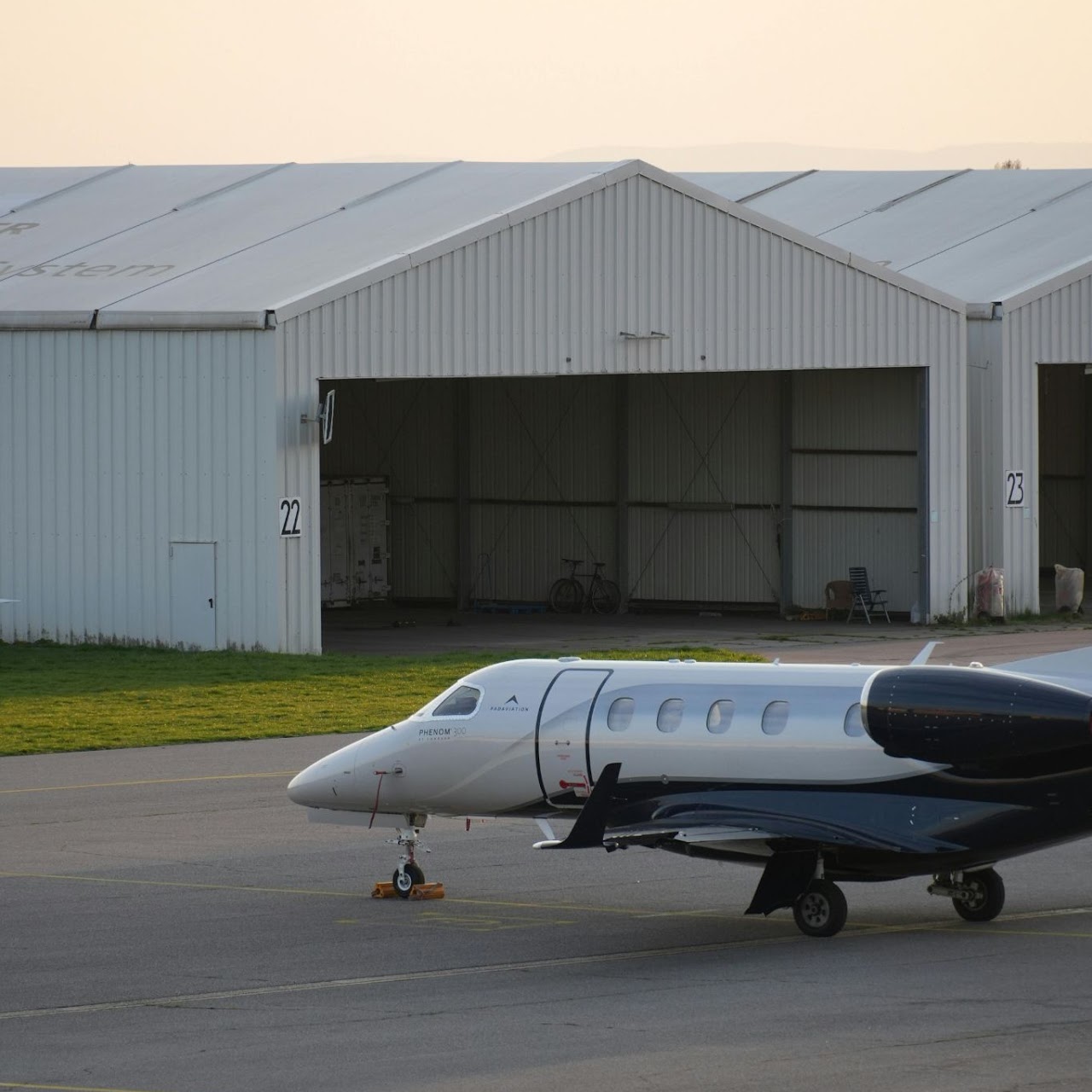 Phenom 300 at hangar